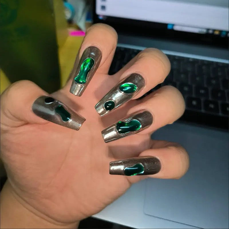 Chrome Emerald Flow 10 stiletto-shaped press-on nails featuring a bold industrial-chic aesthetic.